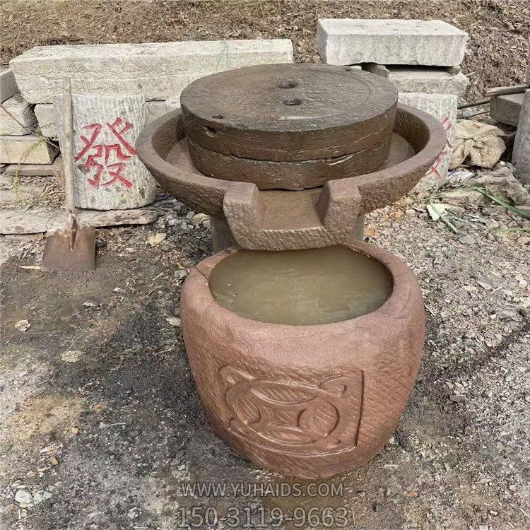 石雕磨盤，磨豆子的傳統(tǒng)設(shè)備雕塑
